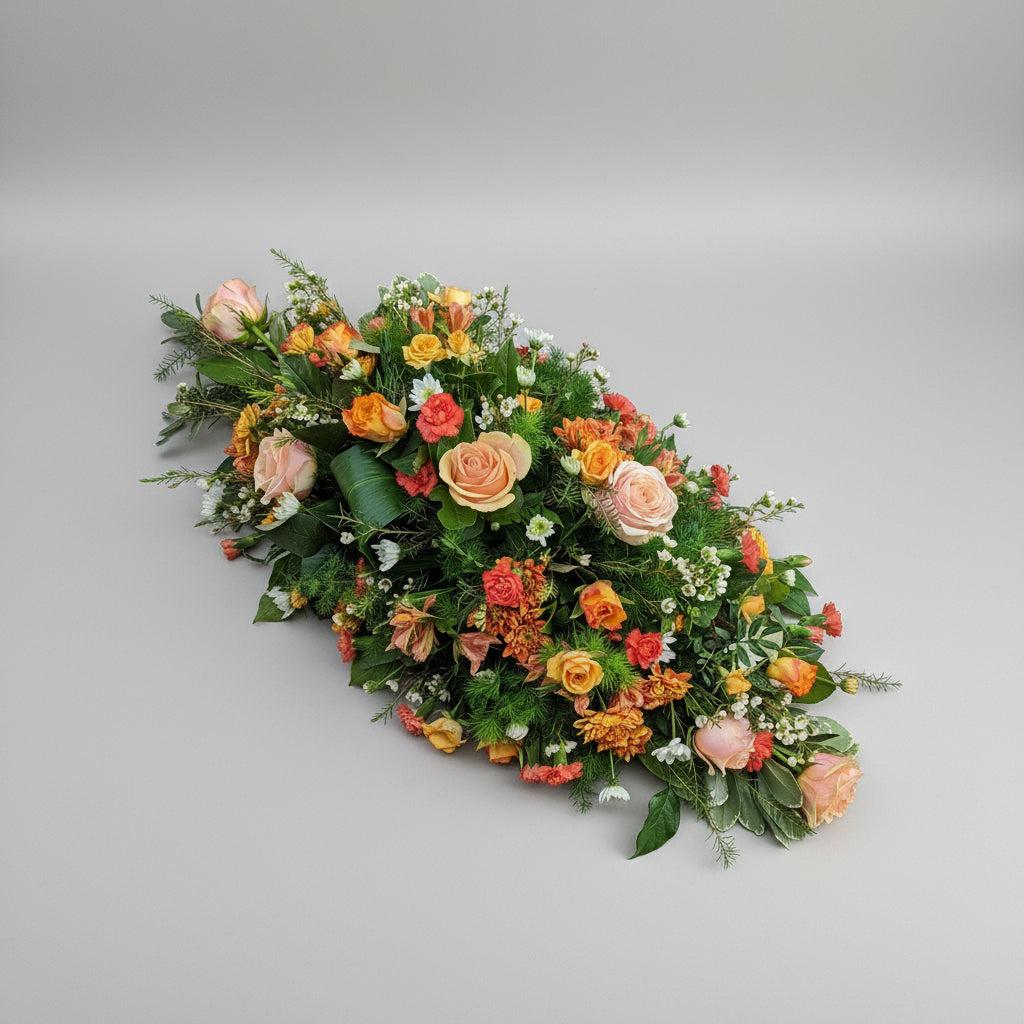 Warm Embrace Casket Spray